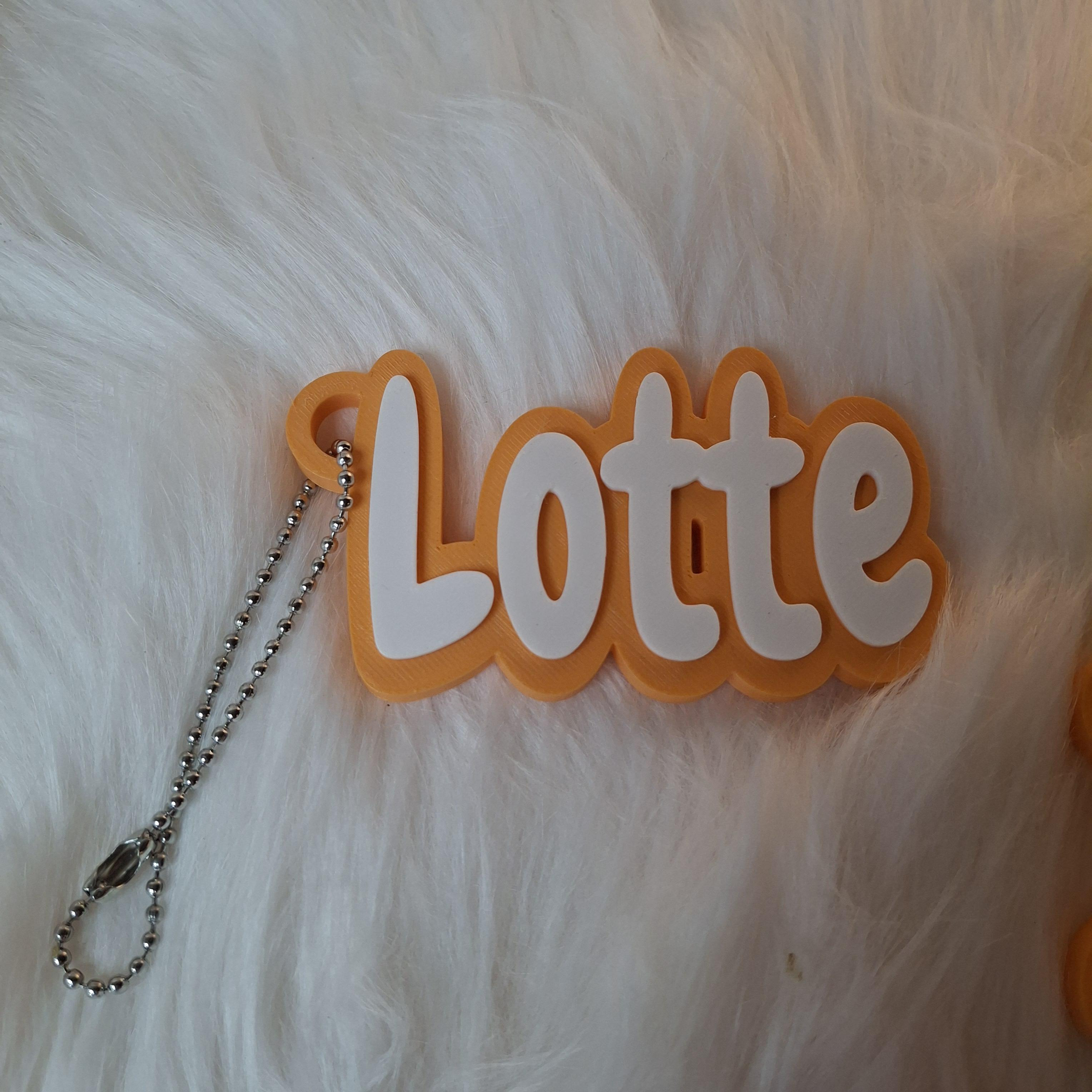 Gepersonaliseerde oranje-witte naamsleutelhanger, 3D geprint