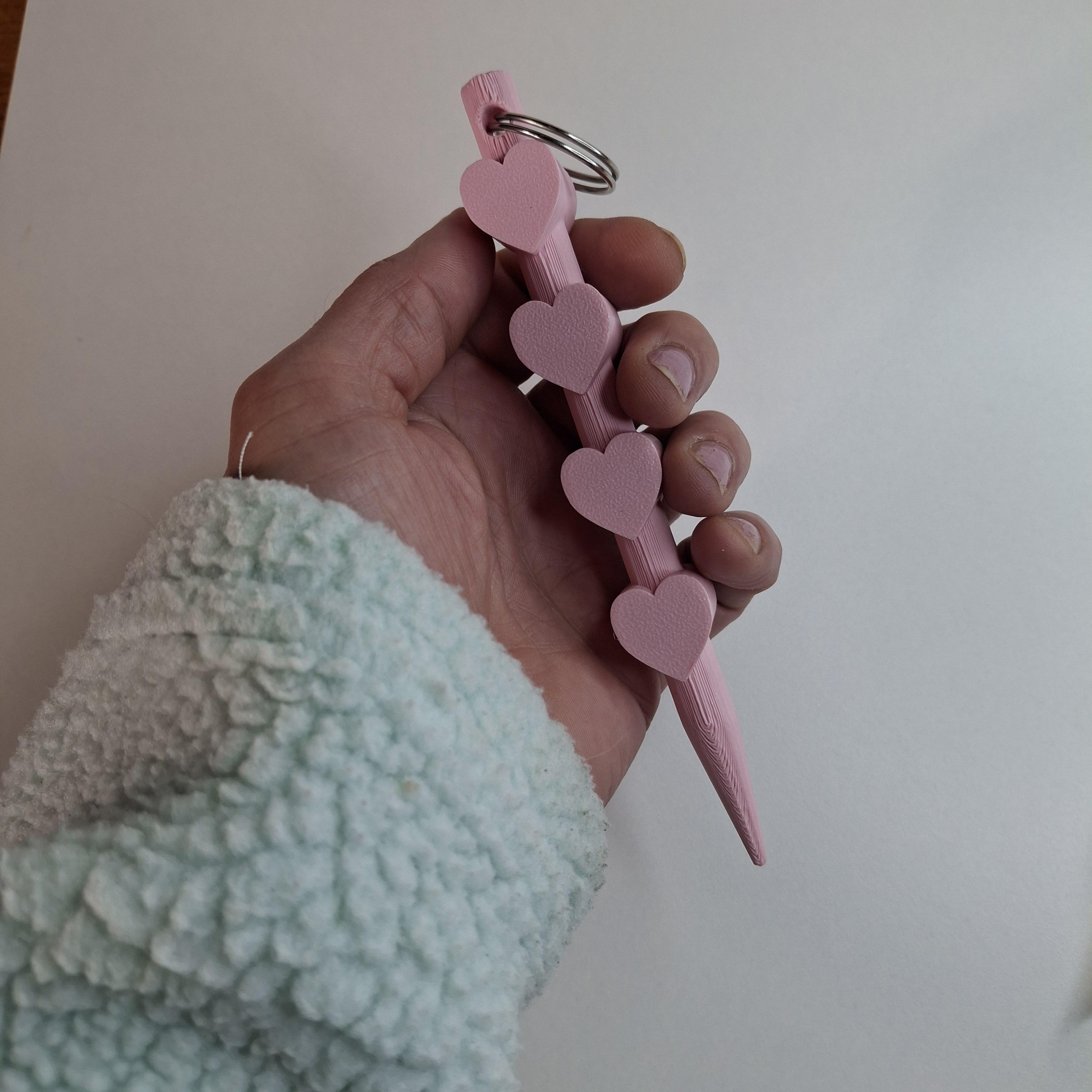 3D geprinte kubotan sleutelhanger in pastelroze