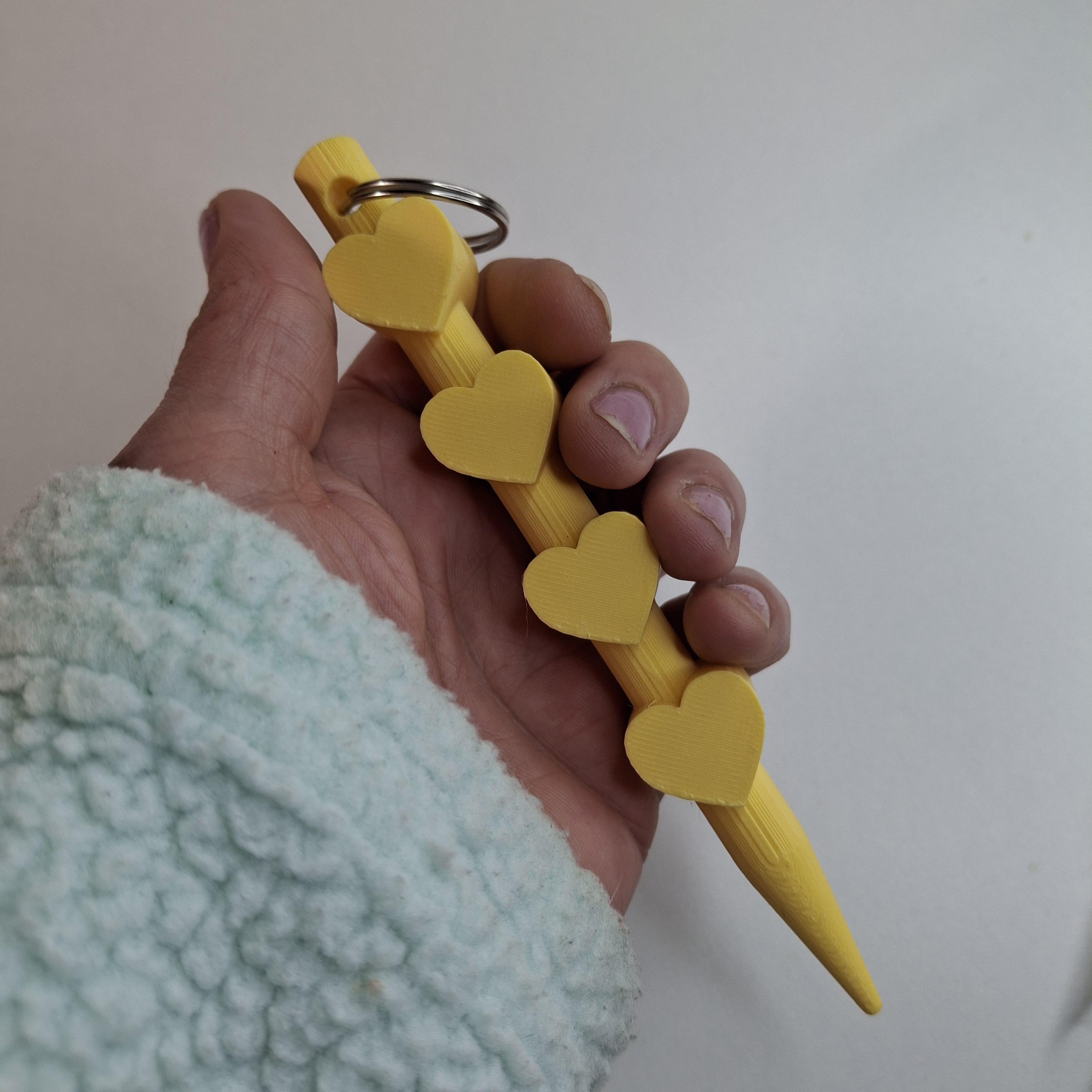 3D geprinte kubotan sleutelhanger in geel