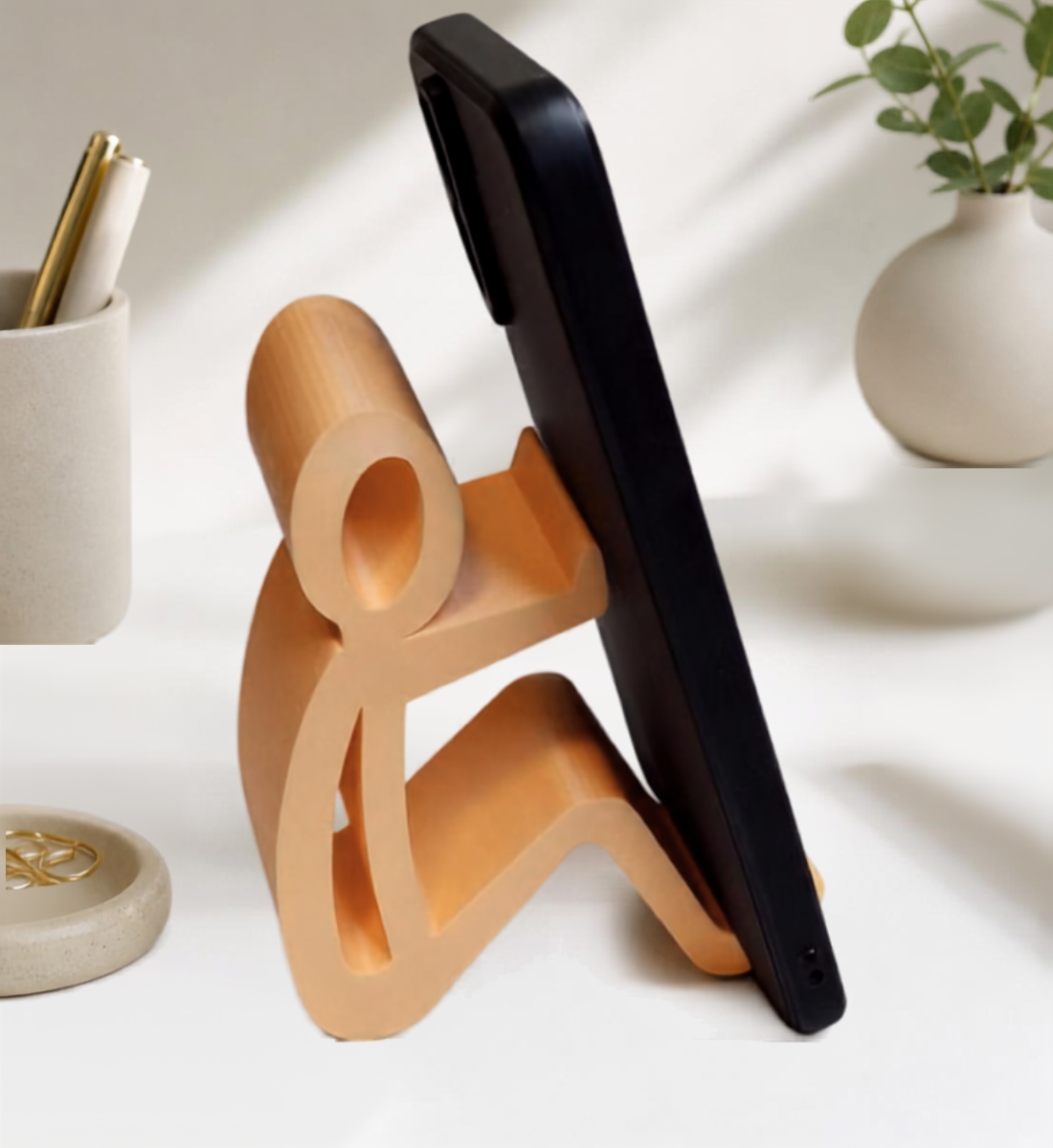 Het Zittend Mannetje – Telefoonhouder – Perzik